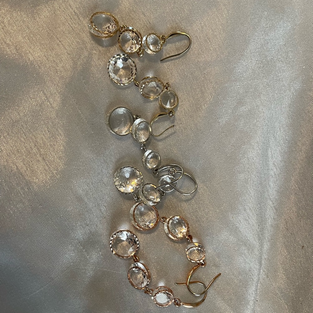 Three pairs of dangle earrings. Silver tone, gold tone, and rose gold tone.